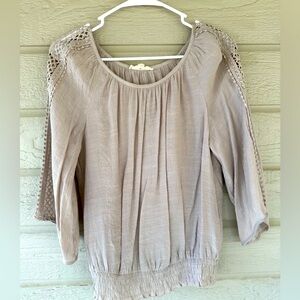 Lace sleeves brown color fitted bottom size S . Never worn